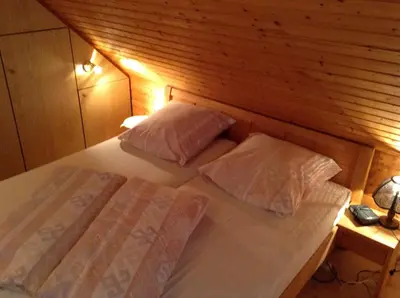 Ein Bett oder Betten in einem Zimmer der Unterkunft Haus Sandboll DHH2