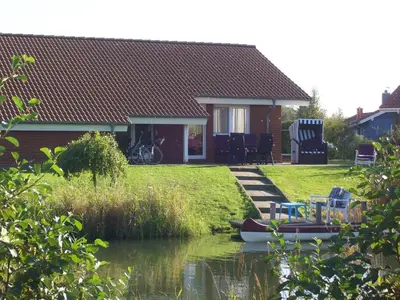 Ein Garten an der Unterkunft Ferienhaus Nordstern