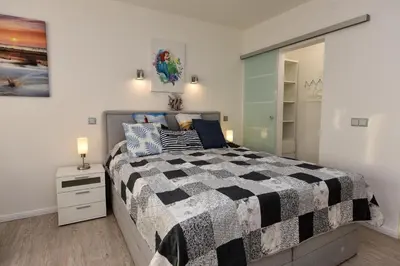 Ein Bett oder Betten in einem Zimmer der Unterkunft Haus 