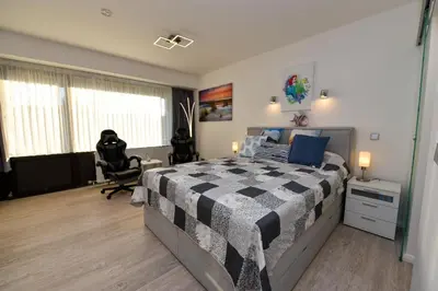 Ein Bett oder Betten in einem Zimmer der Unterkunft Haus 