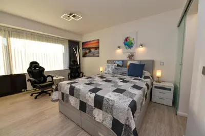 Ein Bett oder Betten in einem Zimmer der Unterkunft Haus 