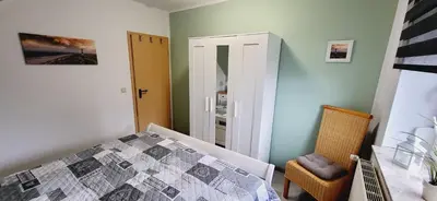 Ein Bett oder Betten in einem Zimmer der Unterkunft Haus Küstenheide