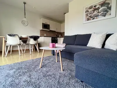 Ein Sitzbereich in der Unterkunft Ferienwohnung Nordseenest