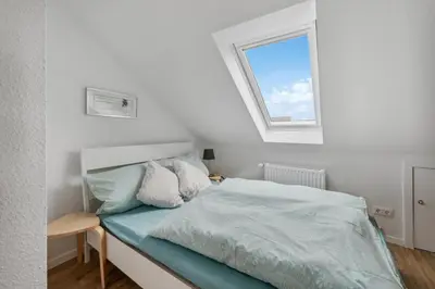 Ein Bett oder Betten in einem Zimmer der Unterkunft Levke