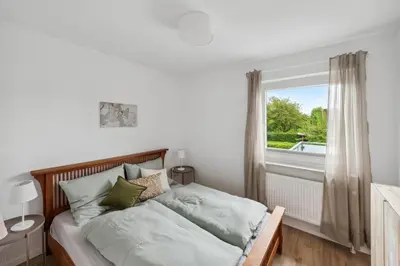 Ein Bett oder Betten in einem Zimmer der Unterkunft Marianne