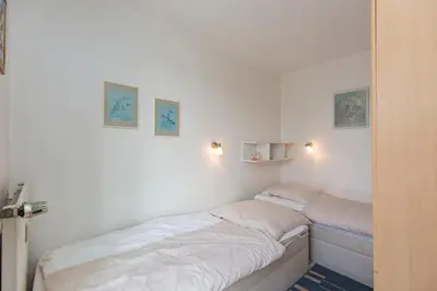 Ein Bett oder Betten in einem Zimmer der Unterkunft Pavillion Nr 9