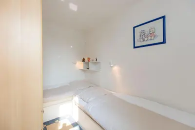 Ein Bett oder Betten in einem Zimmer der Unterkunft Pavillion Nr 9