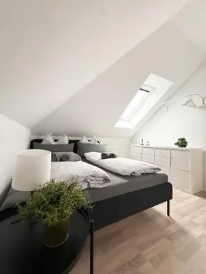 Ein Bett oder Betten in einem Zimmer der Unterkunft Wattwürmchen