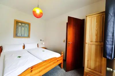 Ein Bett oder Betten in einem Zimmer der Unterkunft Land und Meer LM15
