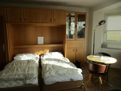 Ein Bett oder Betten in einem Zimmer der Unterkunft NEU Ferienwohnung Haus Elisabeth No 18