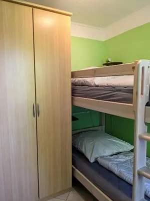 Ein Bett oder Betten in einem Zimmer der Unterkunft Haus Essen Whg. 8, lüttes Glück in Cuxhaven-Duhnen