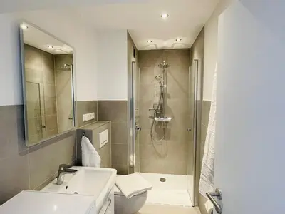 Ein Badezimmer in der Unterkunft Haus Seehund FeWo 15