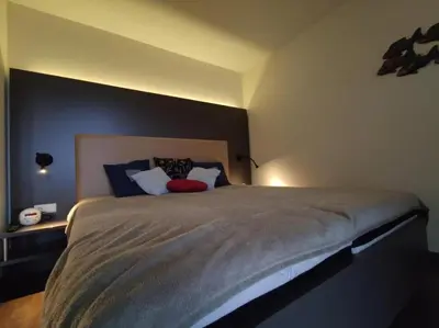 Ein Bett oder Betten in einem Zimmer der Unterkunft Appartment Moin im Deichgraf