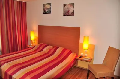 Ein Bett oder Betten in einem Zimmer der Unterkunft Strand-FeWo-Cuxhaven - Duhnen