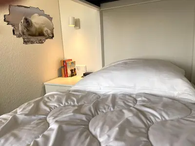 Ein Bett oder Betten in einem Zimmer der Unterkunft Lord Nelson 414