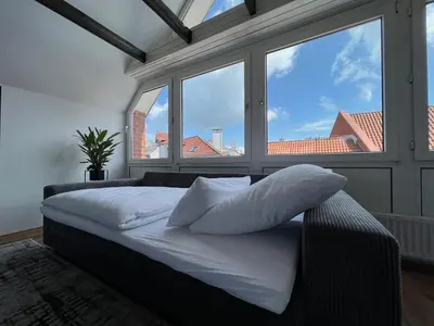 Ein Bett oder Betten in einem Zimmer der Unterkunft Luxuriöse Penthaus Wohnung in Cuxhaven # Cosiness Company