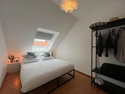 Ein Bett oder Betten in einem Zimmer der Unterkunft Luxuriöse Penthaus Wohnung in Cuxhaven # Cosiness Company