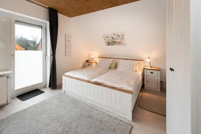Ein Bett oder Betten in einem Zimmer der Unterkunft Katja