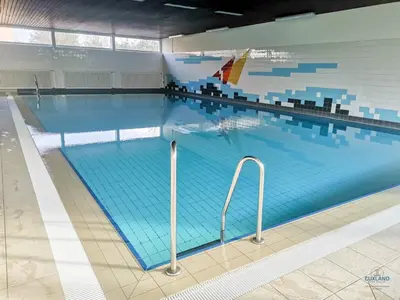 Der Swimmingpool an oder in der Nähe von Haus Frische Brise Sahlenburg Wohnung 06 06 Seaside