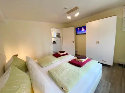 Ein Bett oder Betten in einem Zimmer der Unterkunft Am Oland 11 Bungalow