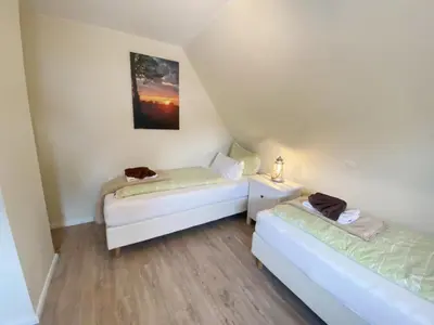 Ein Bett oder Betten in einem Zimmer der Unterkunft Am Oland 11 Am Oland 11, vorne