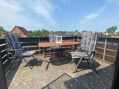 Ein Balkon oder eine Terrasse in der Unterkunft Am Oland 11 Am Oland 11, vorne