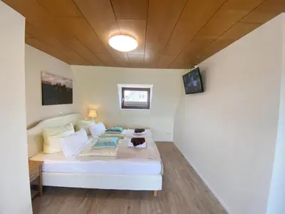 Ein Bett oder Betten in einem Zimmer der Unterkunft Am Oland 11 Am Oland 11, vorne