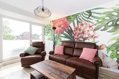 Ein Sitzbereich in der Unterkunft Oasis 4