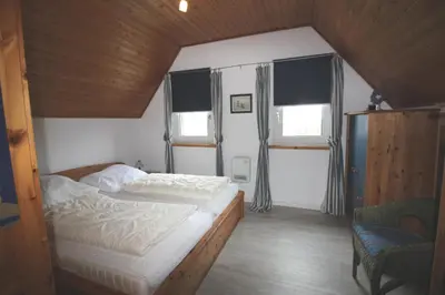 Ein Bett oder Betten in einem Zimmer der Unterkunft Gundi's Ferienhaus