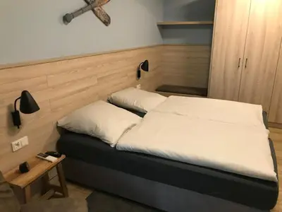 Ein Bett oder Betten in einem Zimmer der Unterkunft Haus Düne, Ferienwohnung 28