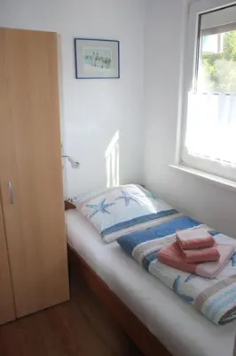 Ein Bett oder Betten in einem Zimmer der Unterkunft Ferienhaus Besken
