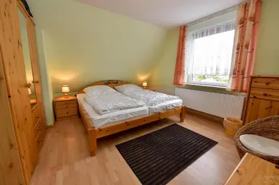 Ein Bett oder Betten in einem Zimmer der Unterkunft Haus 