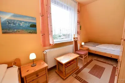Ein Bett oder Betten in einem Zimmer der Unterkunft Haus 