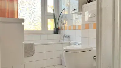 Ein Badezimmer in der Unterkunft Dat Schott