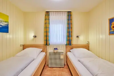 Ein Bett oder Betten in einem Zimmer der Unterkunft Am Ringwall 84A