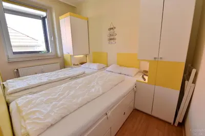 Ein Bett oder Betten in einem Zimmer der Unterkunft Haus Elisabeth Appartement ELI12