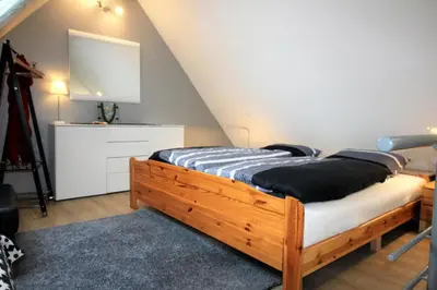 Ein Bett oder Betten in einem Zimmer der Unterkunft Kiebitzstieg 22, Whg 14