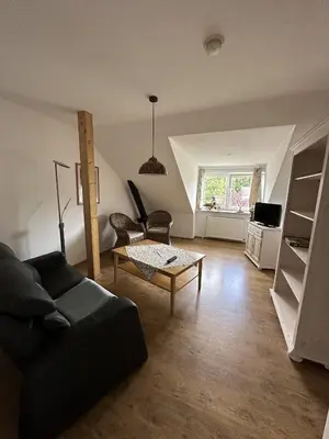 Ein Sitzbereich in der Unterkunft Ferienwohnung Molly