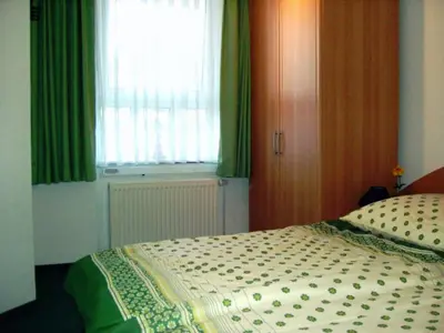 Ein Bett oder Betten in einem Zimmer der Unterkunft de ebb