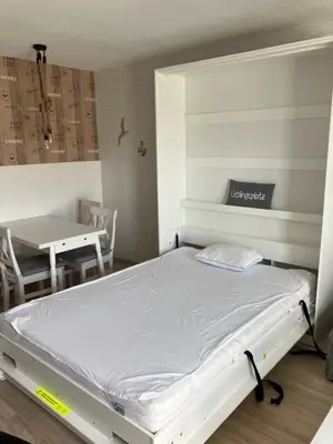 Ein Bett oder Betten in einem Zimmer der Unterkunft Blinkfuer 10
