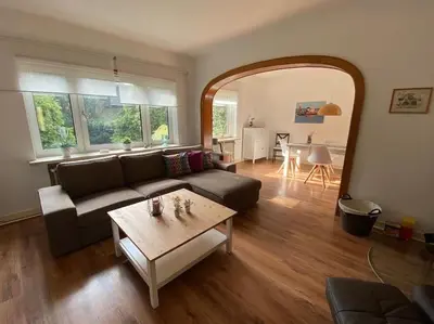 Ein Sitzbereich in der Unterkunft FEDDERSEN LIVING Große Ferienwohnung - Garten - Terrasse - Smart TV - Netflix