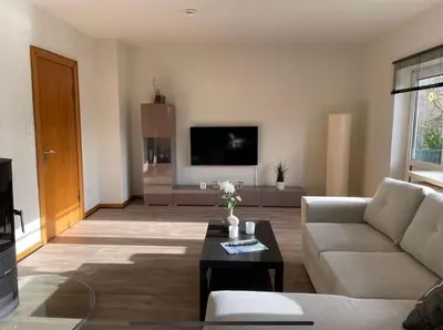 TV/Unterhaltungsangebot in der Unterkunft FEDDERSEN LIVING Große Ferienwohnung - Garten - Terrasse - Smart TV - Netflix