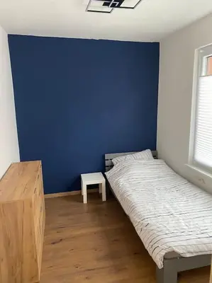 Ein Bett oder Betten in einem Zimmer der Unterkunft Koog Rooms