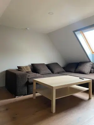 Ein Sitzbereich in der Unterkunft Koog Rooms