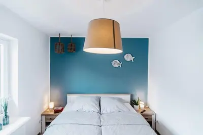 Ein Bett oder Betten in einem Zimmer der Unterkunft Hinnerk