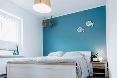 Ein Bett oder Betten in einem Zimmer der Unterkunft Hinnerk