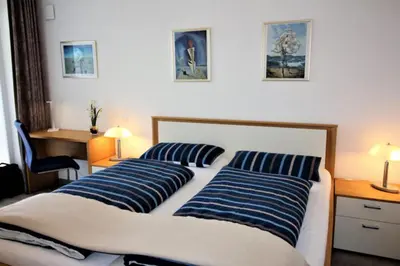 Ein Bett oder Betten in einem Zimmer der Unterkunft de stielitsch
