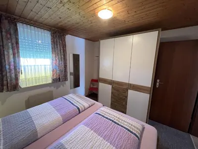 Ein Bett oder Betten in einem Zimmer der Unterkunft Haus am Deich