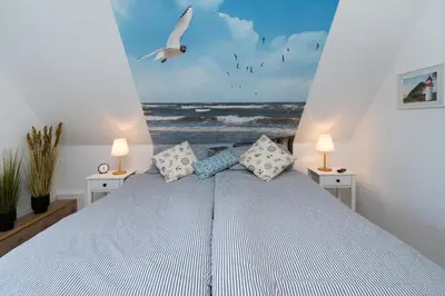 Ein Bett oder Betten in einem Zimmer der Unterkunft Tinka