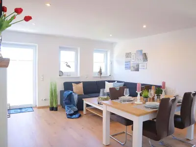 Ein Sitzbereich in der Unterkunft Ferienwohnung Dat Mutt